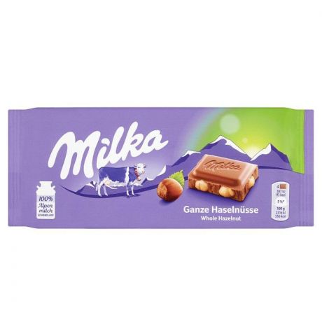 Milka Oriešková mliečna čokoláda, celé lieskové orechy 100 g